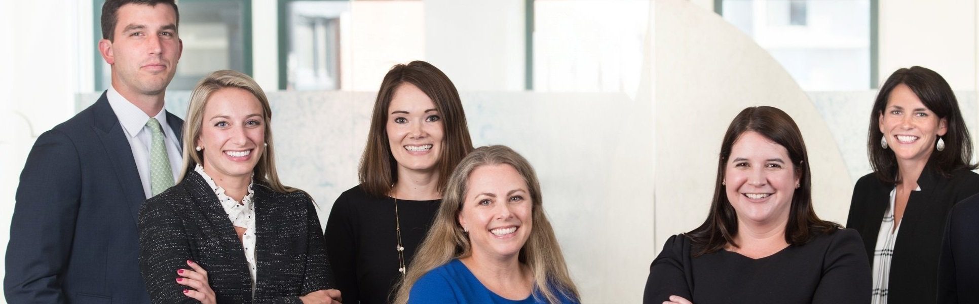 Members of the Spinnaker Trust team inside the office